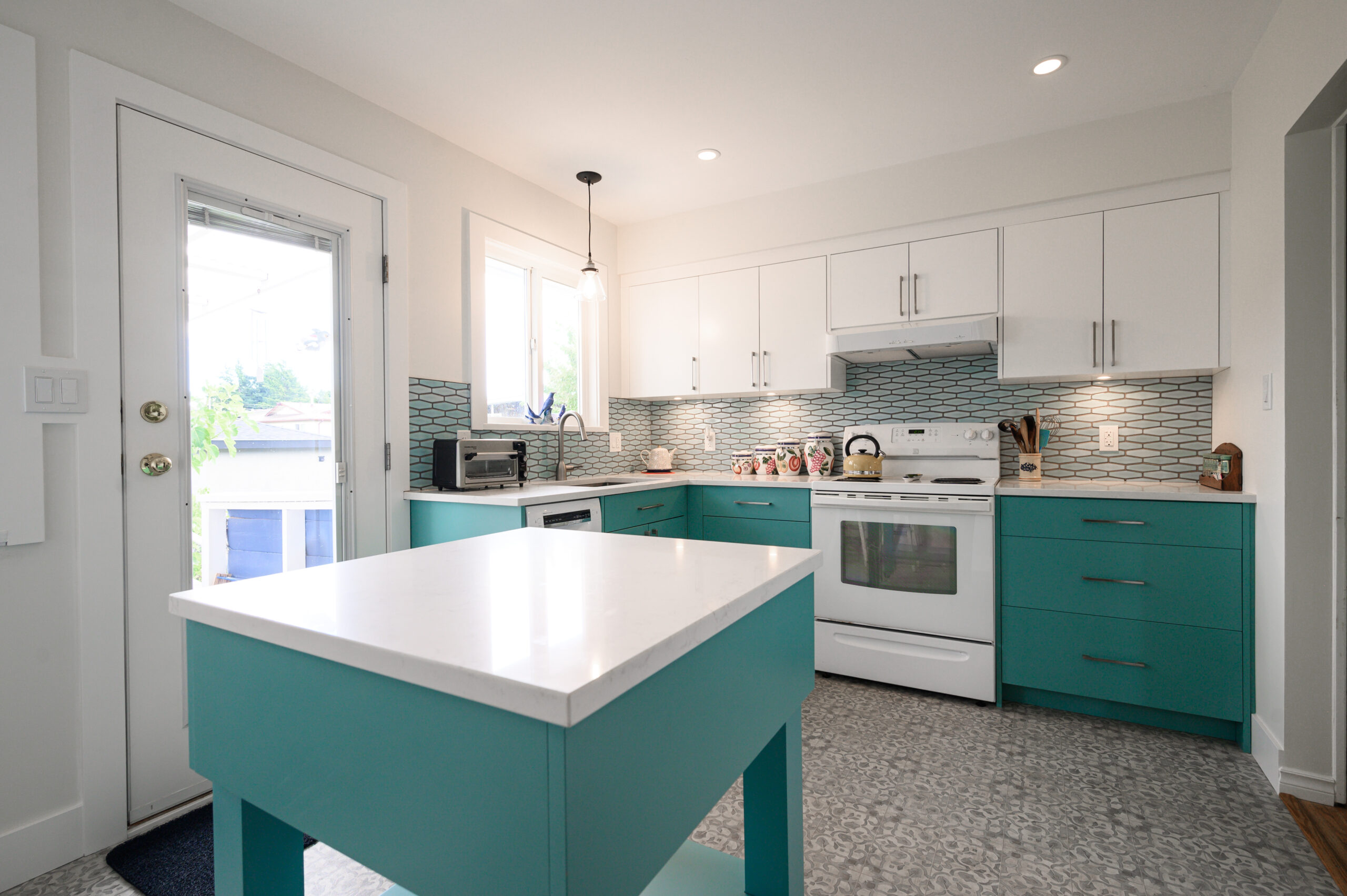 Kitchen Cabinets painted in a teal colour